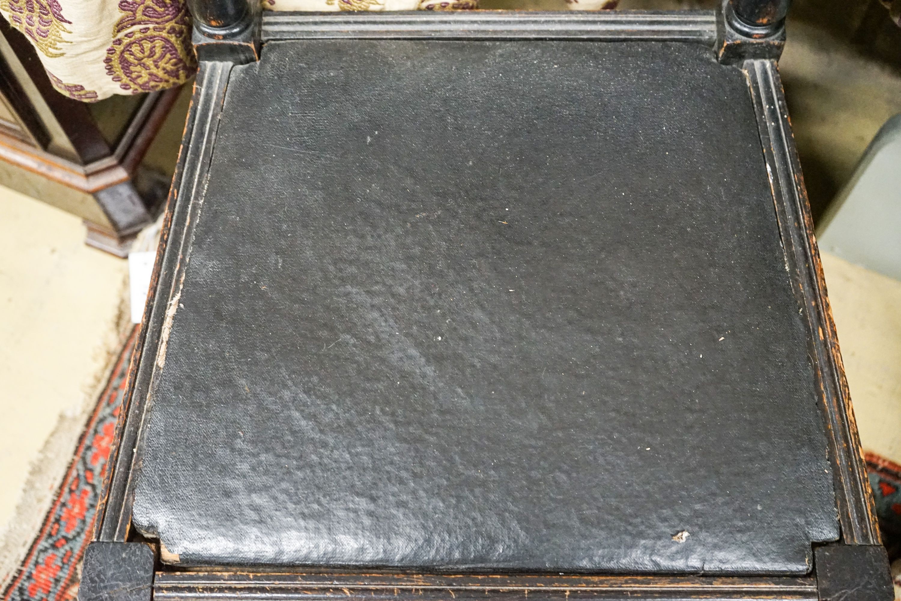 An ebonised beech chair designed by Edward Blore for Lambeth Palace. made by Gillow & Co. original oil cloth seat. Bears an ivorine plaque, 'Lambeth Palace'